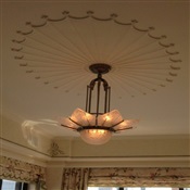 Chandelier installed flush on ceiling, NYC.